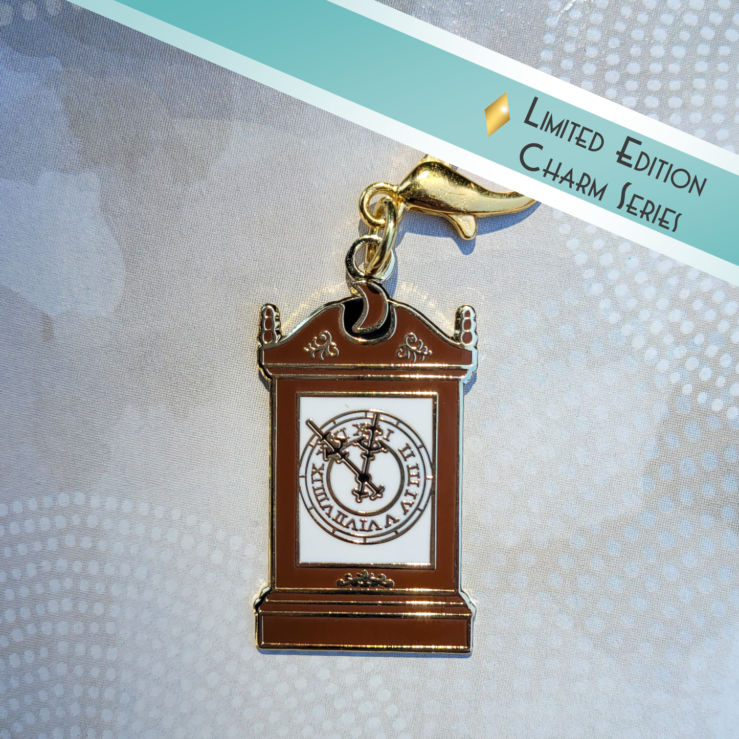 The Crowley Clock Collector's Charm in Hard Enamel