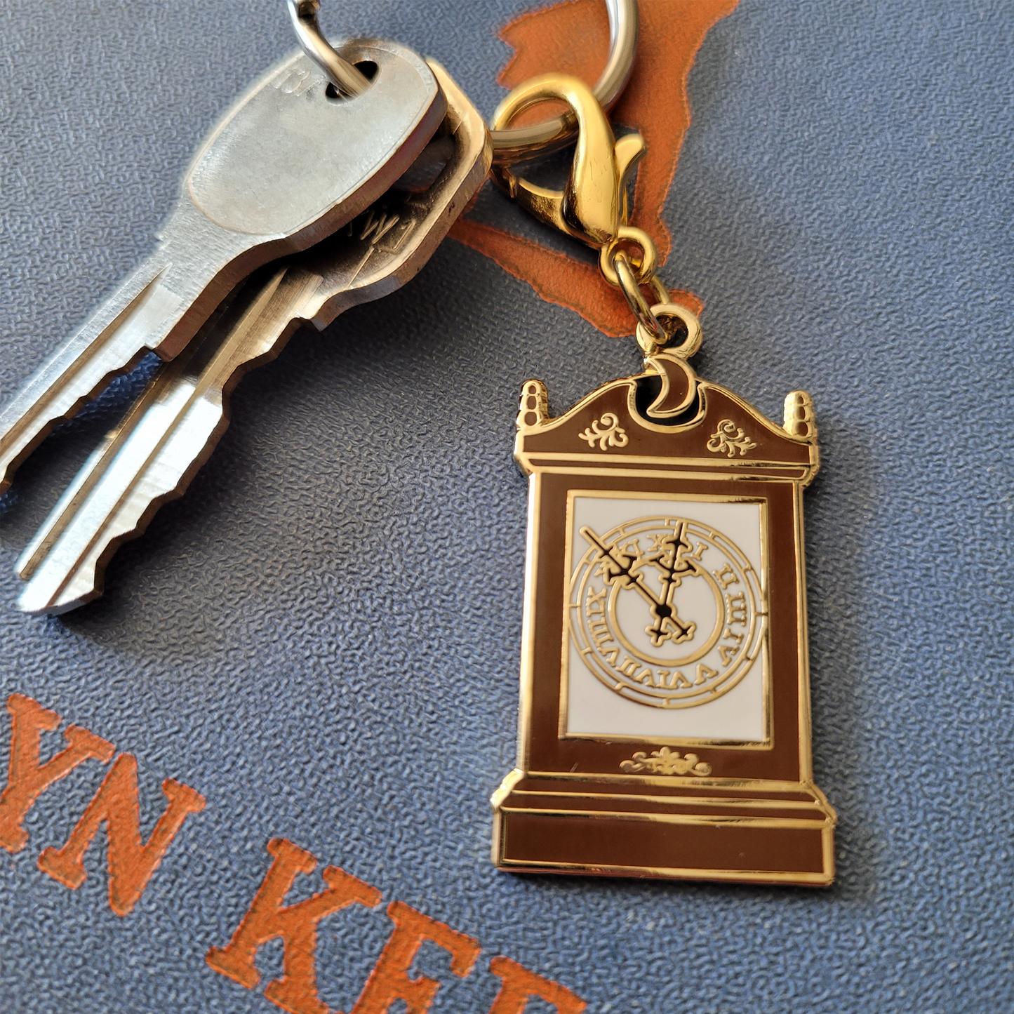 The Crowley Clock Collector's Charm in Hard Enamel