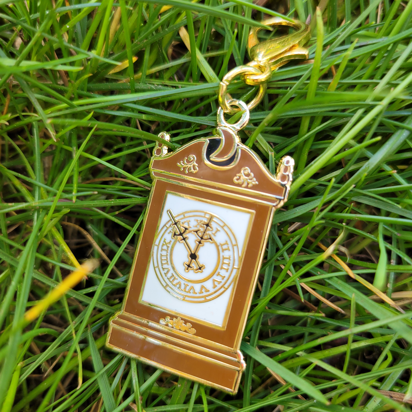 The Crowley Clock Collector's Charm in Hard Enamel