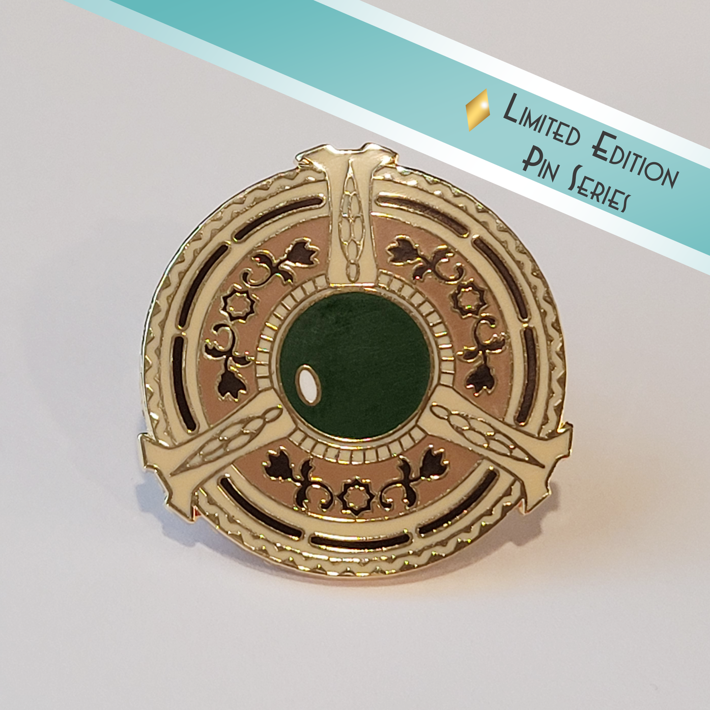 Emerald Medallion Collector's Pin in Hard Enamel